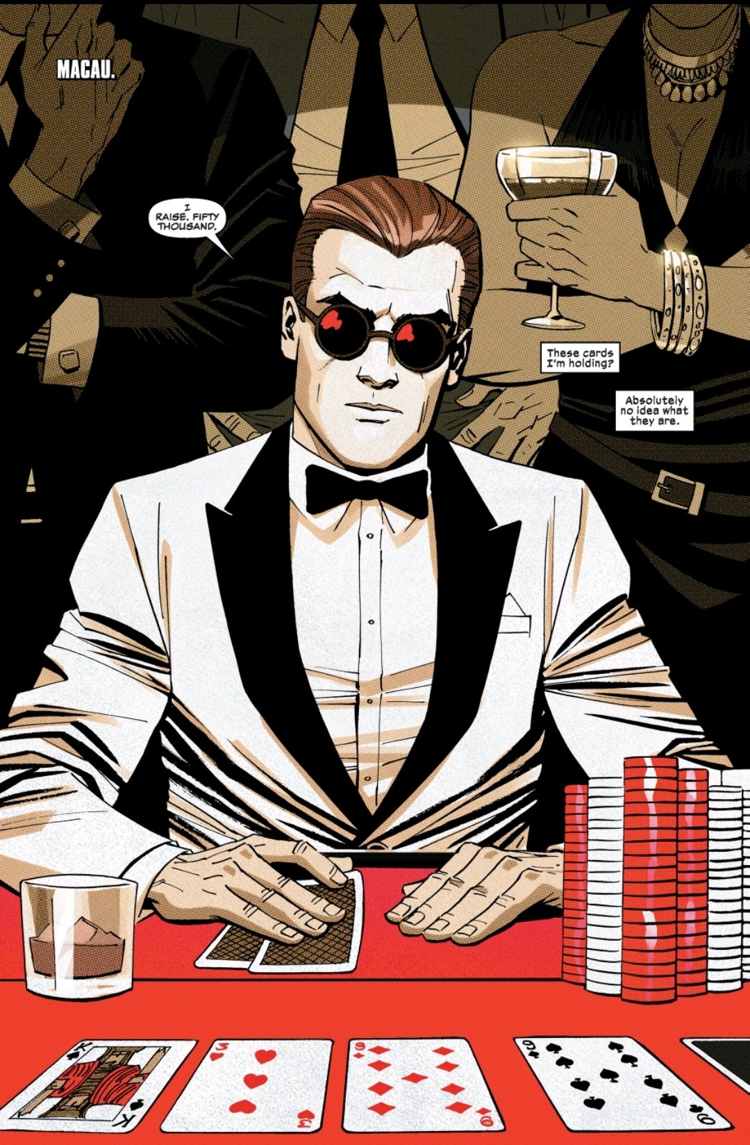 Matt Murdock in a white tux at a casino table
