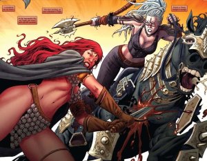 Red Sonja fighting in her chain-mail bikini